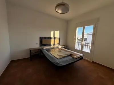 Cama o camas de una habitación en Casa Rural Castillo de Alanis
