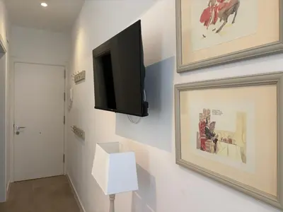 Una televisión o centro de entretenimiento en Casa Sultana
