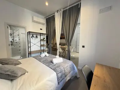 Cama o camas de una habitación en Loft Omeya
