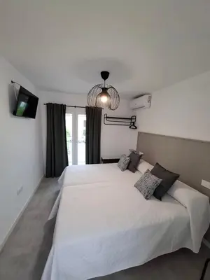 Cama o camas de una habitación en Plaza de España