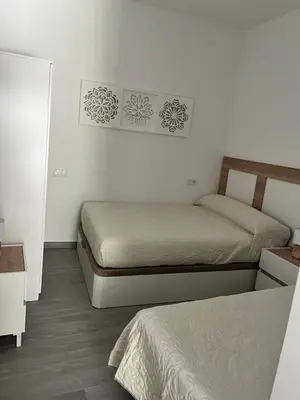 Cama o camas de una habitación en Apartamento Rincón del Olivar II