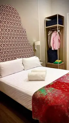 Cama o camas de una habitación en Puerta de la Ribera Centro