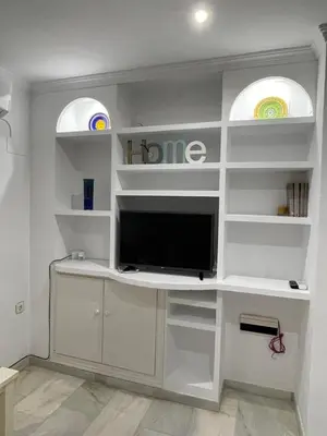 Una televisión o centro de entretenimiento en Apartamento CAMINO MOZÁRABE