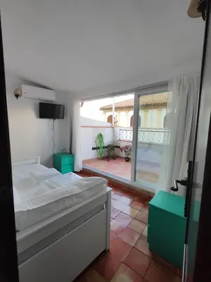 Cama o camas de una habitación en Casa de los Arcos Parking Free en las inmediaciones