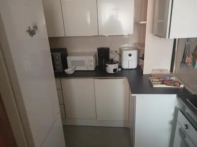 Una cocina o zona de cocina en Solo con hora de llegada