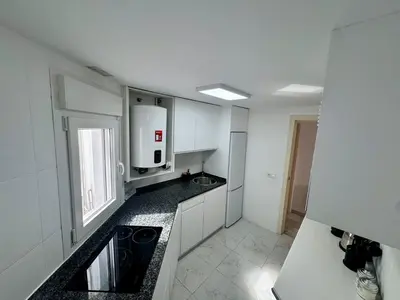 Una cocina o zona de cocina en DS Córdoba Centro