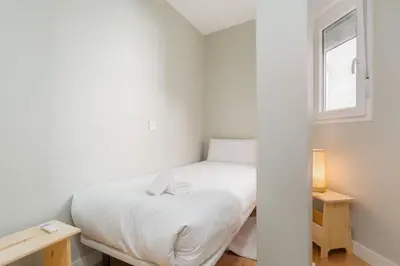 Cama o camas de una habitación en Apartment with views -Santa Isabel Square- 2Bd1Bth