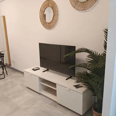 Una televisión o centro de entretenimiento en Azafran Loft