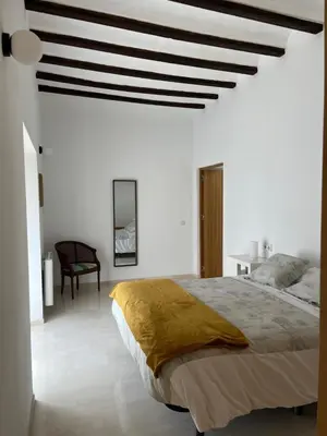 Cama o camas de una habitación en Casa con jardín y piscina en Córdoba