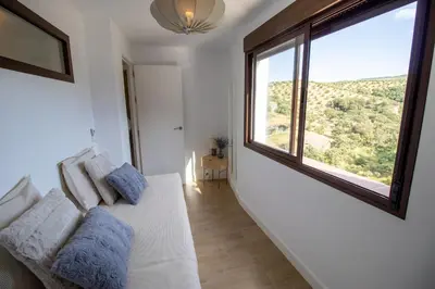 Cama o camas de una habitación en El Secreto de Setenil