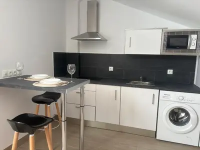 Una cocina o zona de cocina en Apartamentos Élan