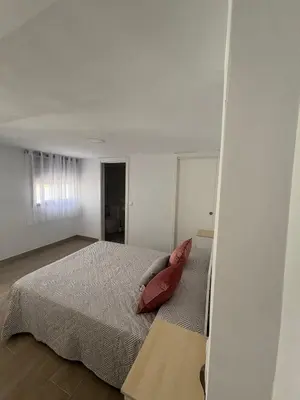 Cama o camas de una habitación en Apartamentos Élan