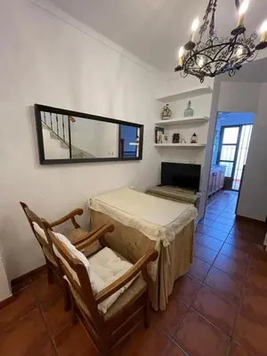 Una televisión o centro de entretenimiento en Juanita La Larga