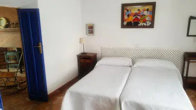 Cama o camas de una habitación en Vivienda Rural El Retiro