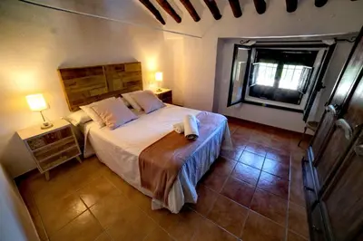 Cama o camas de una habitación en Villasecre Casa Rural