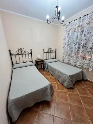 Cama o camas de una habitación en cortijo los frailes