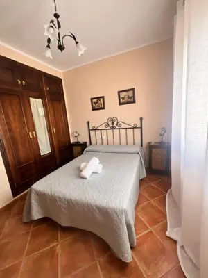 Cama o camas de una habitación en cortijo los frailes