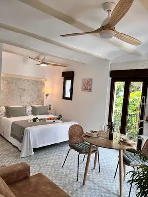 Cama o camas de una habitación en Loft Balcones de la Judería