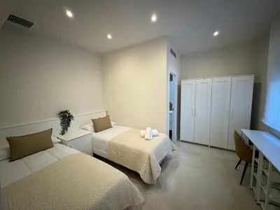 Cama o camas de una habitación en ZAHIRA Homes