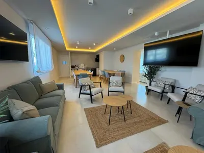 Una televisión o centro de entretenimiento en ZAHIRA Homes
