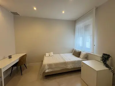 Cama o camas de una habitación en ZAHIRA Homes
