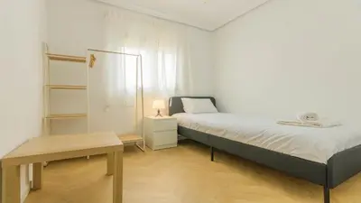 Cama o camas de una habitación en Apartamento Luz de Macarena en Sevilla