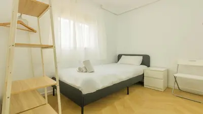 Cama o camas de una habitación en Apartamento Luz de Macarena en Sevilla