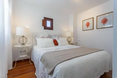 Cama o camas de una habitación en Green-Apartments San Bernardo