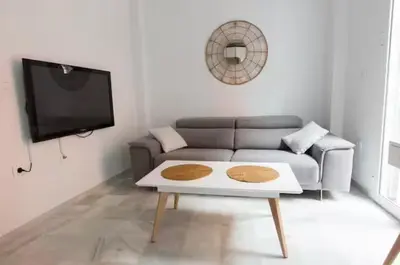 Una televisión o centro de entretenimiento en Apartamento en Sevilla centro