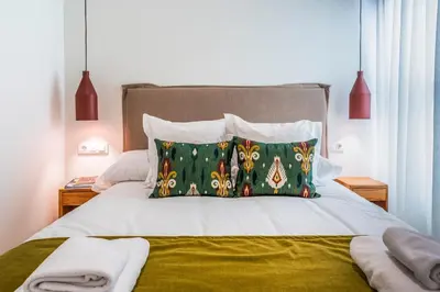 Cama o camas de una habitación en Los Patios de Feria - Azahar