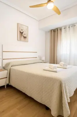 Cama o camas de una habitación en Alojamiento Baeza - Leones 9B