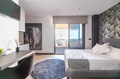 Cama o camas de una habitación en Atico moderno en Nervion con terraza