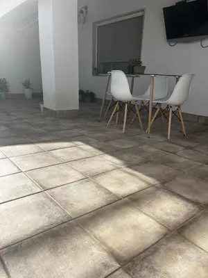 Una televisión o centro de entretenimiento en La terraza de la subbética