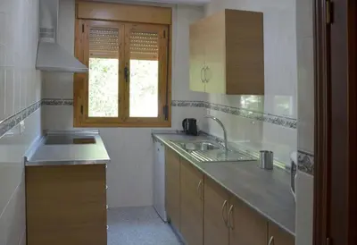 Una cocina o zona de cocina en CASA PATIO LAS PALMERAs 7 y 8