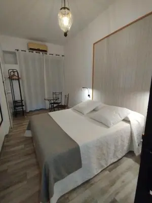 Cama o camas de una habitación en La REJA SUITE