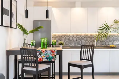 Una cocina o zona de cocina en Unika Homes Gran Plaza & Terrace