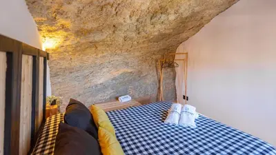Cama o camas de una habitación en Bajo la Alcazaba Setenil de las Bodegas by Ruralidays