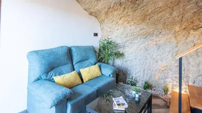 Zona de estar de Bajo la Alcazaba Setenil de las Bodegas by Ruralidays