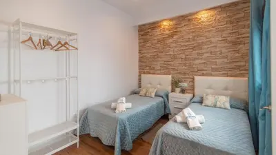 Cama o camas de una habitación en Cantarería Jazmín Setenil de las Bodegas by Ruralidays