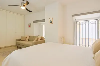 Cama o camas de una habitación en Lirios de Sevilla - Vacacional Sevilla