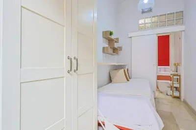 Cama o camas de una habitación en Lirios de Sevilla - Vacacional Sevilla