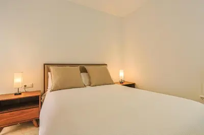 Cama o camas de una habitación en Lirios de Sevilla - Vacacional Sevilla