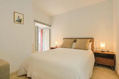 Cama o camas de una habitación en Lirios de Sevilla - Vacacional Sevilla