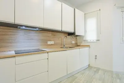 Una cocina o zona de cocina en Apartamento Peral - Vacacional Sevilla