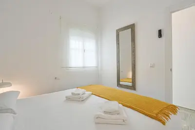 Cama o camas de una habitación en Apartamento Peral - Vacacional Sevilla