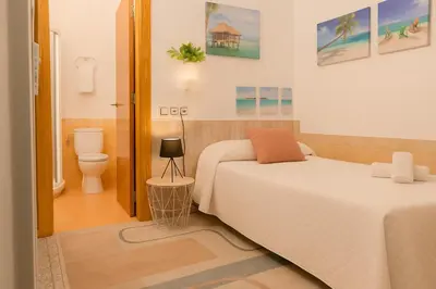 Cama o camas de una habitación en Aire Hostal en Los Alcores