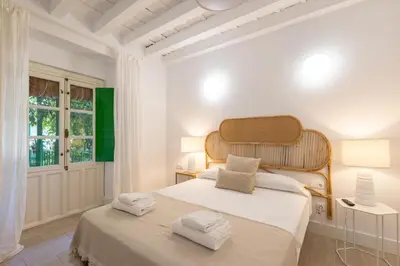 Cama o camas de una habitación en Alcazares Deluxe Suite by Valcambre