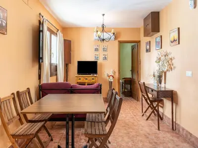 Una televisión o centro de entretenimiento en Studio in Spain with Private Pool and Garden