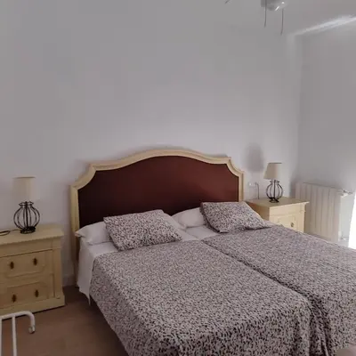Cama o camas de una habitación en Casa rural Las Canales - Iznájar