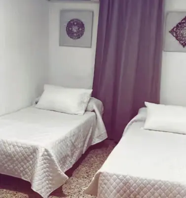 Cama o camas de una habitación en Apartamento en sevilla con encanto y muy bien ubicado